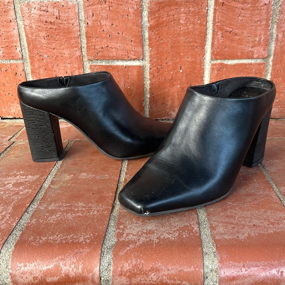 Closed toed low black heels